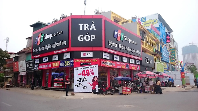 FPT Shop bắt tay Vietcombank biến hơn 600 cửa hàng trở thành “cây ATM” rút, chuyển tiền